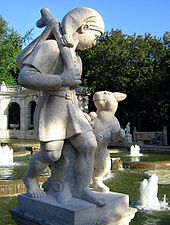 Sculpture située à Berlin représentant le chat botté et son maître