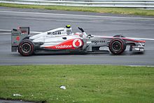 Photo de Jenson Button lors de son tour d'honneur après sa victoire.