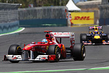 Photo de Fernando Alonso et Mark Webber lors de la course.