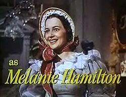 Olivia de Havilland as Melanie Hamilton in Gone With the Wind trailer.jpg