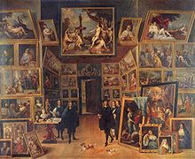 L’Archiduc Léopold-Guillaume de Habsbourg dans sa galerie de peinture, deuxième tiers du XVIIe siècle peint par David Teniers le jeune. Conformément à l'usage de l'époque, les tableaux sont exposés cadre contre cadre, remplissant tout l'espace du sol au plafond.