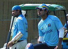 Photographie représentant Tillakaratne Dilshan et Kumar Sangakkara, prise en 2010.