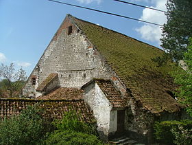 La Ferme de l'Abbiette, au pignon de laquelle s'adosse la chapelle Notre-Dame de Grâce.